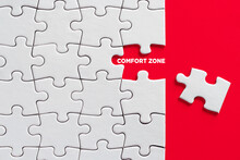 The word comfort zone with missing puzzle piece