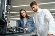 © fotofabrika - Young couple choosing new gas stove in home appliances store