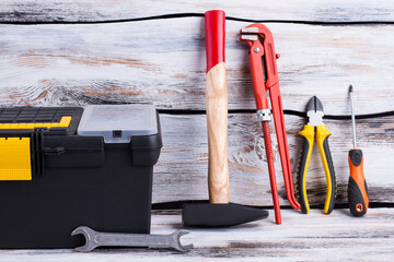 Wall Mural - Different repair tools on wooden background.