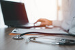 © Suphachai - Specialized doctors are working with laptop to print patient information or are analyzing the cause of pathogens, Concept of medical treatment Health care, public health, prevention of virus.