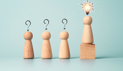 Poster - wooden figure with drawing light bulb on cube among other wooden with question mark , problem solvin