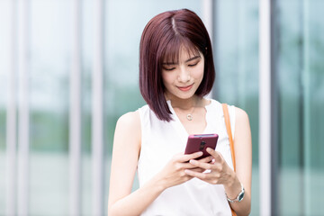 Poster - businesswoman use smart phone