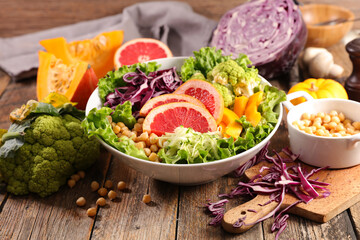 Wall Mural - buddha bowl with chickpea, cabbage, avocado and grapefruit