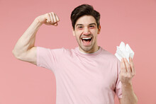 Happy Allergic Man Has Red Eyes Runny Nose Suffer From Allergy Hold Paper Napkin Recovery Isolated On Pastel Pink Color Wall Background Studio. Healthy Lifestyle Disease Treatment Cold Season Concept.