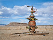 unused head of oil well with numerous valves in a desert landscape of central Utah