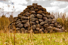Huge Pile Of The Rocks In Middle Of Meadow