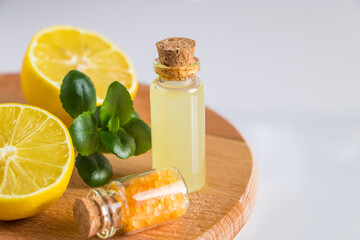 Spa cosmetics with citrus on a white background. Eco product for alternative medicine with lemon.