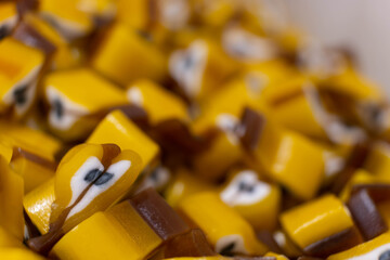 Wall Mural - Yellow sweet jelly like little pear and candies with sugar. Macro.