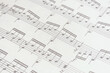 Paper sheet with musical notes, scales and exercises, desaturated