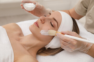 Sticker - Young woman during face peeling procedure in salon