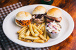 slider trio with French fries and coleslaw