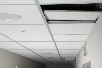 white false ceiling with open hole