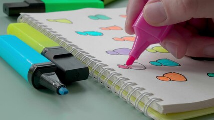 Wall Mural - Diversity and inclusion concept. Close-up of hands drawing colorful figurines.