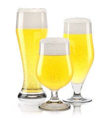 Wall Mural - Set of fresh light beer glasses with bubble froth isolated on white background.