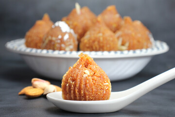 Wall Mural - Besan ke ladoo or Motichur ke ladoo or Modak made from Chickpea flour,desi ghee and sugar during festival season like Diwali nad Ganesh chaturthi.