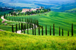 © robertharding - Farmhouse in green summer landscape near Crete Senesi, Tuscany, Italy