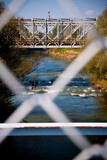 Fototapeta Nowy Jork - bridge over river with train pass