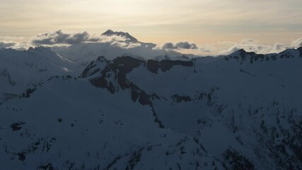 Wall Mural - aerial dramatic north cascade mountains winter sunset