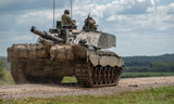 super close-up of a British army Challenger 2 ii FV4034 main battle tank in action on a military battle exercise,  Wiltshire UK