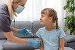 © Angelov - Little girl getting vaccination from pediatrician at medical office