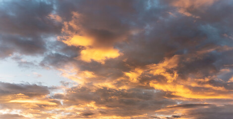 orange afternoon sun lit on dark blue sunset sky, nature background