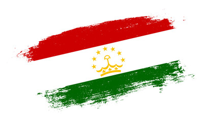 Flag of Tajikistan country on brush paint stroke trail view. Elegant texture of national country flag