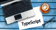 TypeScript Programming Language. Word TypeScript On Paper And Laptop

