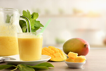 Wall Mural - Breakfast with natural mango juice with milk in kitchen