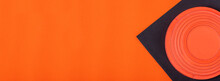 Web Banner With Clay Target On Black And Orange Geometric Background. Skeet Shooting