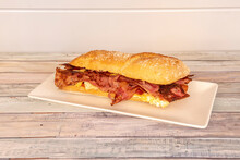 Great Sandwich Of French Omelette And A Lot Of Fried Bacon Inside A Loaf Of Ciabatta Bread