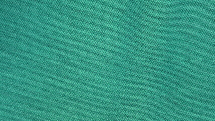 Wall Mural - turquoise green woolen fabric texture background. bright green clothing background. turquoise texture with blank space for design.