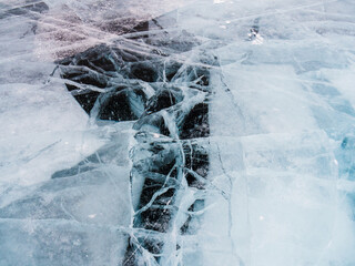 Beautiful transparent ice of winter lake