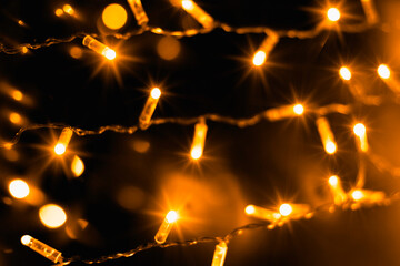 Illuminating Gold New Year Background with Blurred Lights