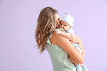 happy mother with cute little baby on color background