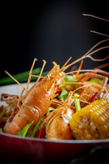 Wall Mural - Spicy seafood bucket, Cook spicy shrimp mixed seafood Thai style, Thai foods.;