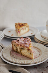 Sticker - Closeup shot of delicious rhubarb cheese pie on a plate on a white table