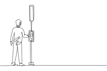 Poster - Single continuous line drawing a man pushes a button at a traffic light to cross the road on a zebra crossing. Road is busy during office hours Dynamic one line draw graphic design vector illustration