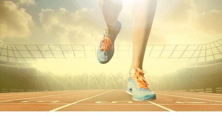 Wall Mural - Composition of legs of female athlete running with copy space over sports stadium