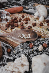 Wall Mural - Vertical shot of various spices, seasonings and ingredients on a cutting board