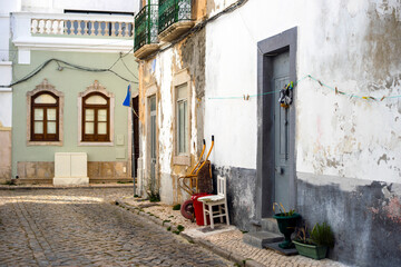 Sticker - Narrow street of historic fishermen's town of Olhao, Algarve, Portugal