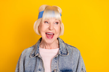 Canvas Print - Photo portrait of cool positive granny smiling curious looking empty space isolated on bright yellow color background