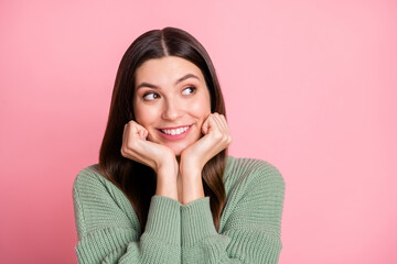 Poster - Photo of optimistic cool girl fists head look empty space wear sweater isolated on pink color background