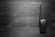 Walkie talkie radio station on the black flat lay background with copy space.