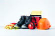 Personal protective equipment on light grey background. Safety work concept.