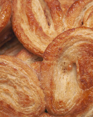 Poster - Closeup of freshly baked palmiers with sugar