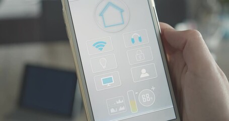Woman holds smartphone with smart home app all in one functions to control temperature, light, entertainment, security systems