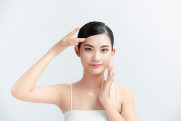 Wall Mural - Beauty portrait of young Asian woman on white background