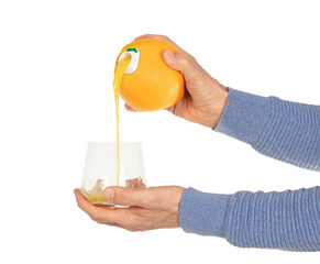 Wall Mural - Orange juice pouring in glass