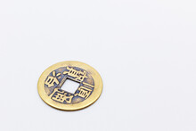 A Lucky Coin From China On White Background