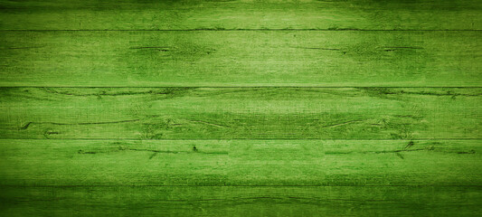 Wall Mural - abstract grunge old neon green painted wooden texture - wood board background panorama banner.